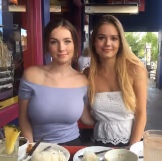 Two Girls Comparing Boobs