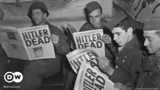 U.S. Soldiers Reading 'Hitler Dead'