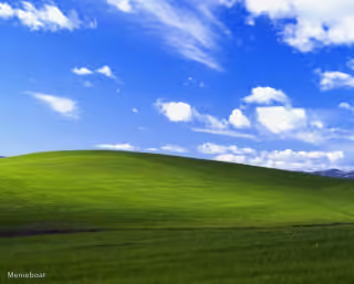 Windows Background - Hill With Blue Skies and Clouds