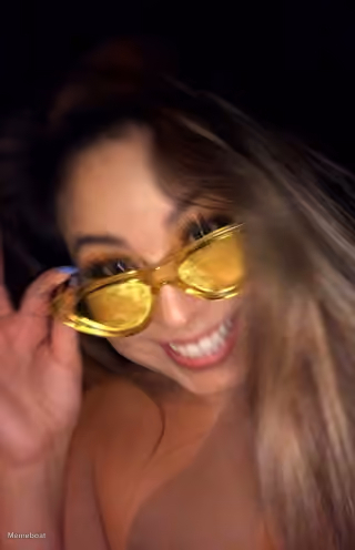 Woman in Yellow Sunglasses