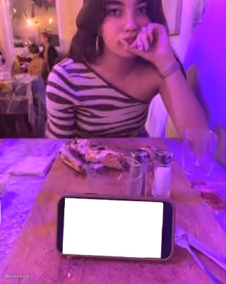 Woman In Zebra Top With Phone