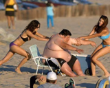 Women Helping Fat Guy