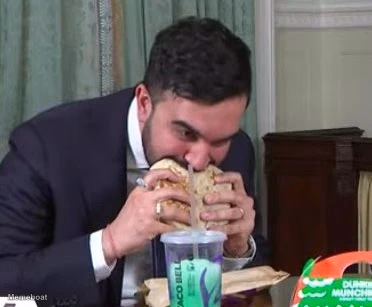 Zohran Mamdani Devouring His Crunch Wrap Supreme - meme generator image preview