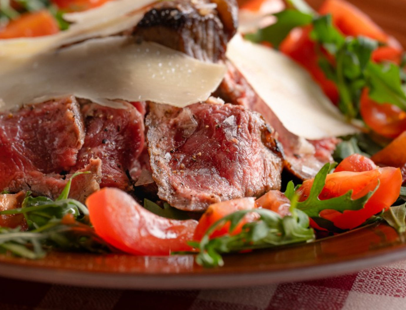 Tagliata Di Manzo Con Rucola E Grana