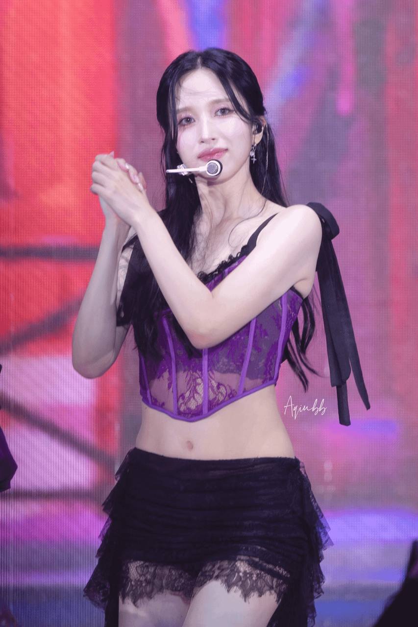 Winter's Enchanting Stage Presence: AESPA's Visual Ace Shines in Purple
