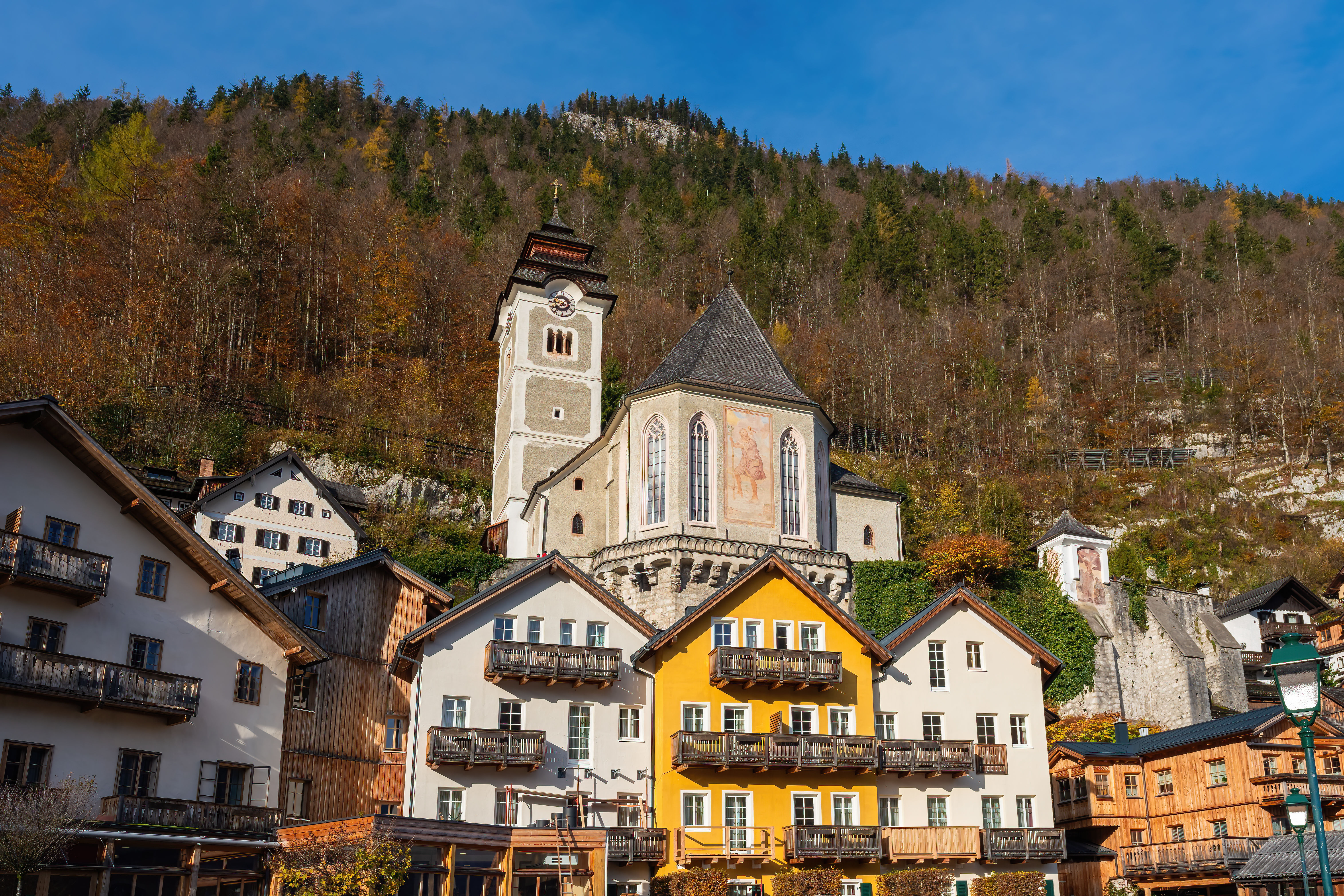 Hallstatt’s Bone House chapel with hand-painted skulls arranged in rows.