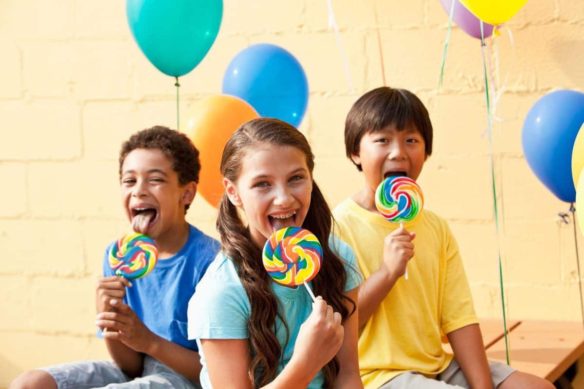 Children with lollipops and balloons candy, crafts, diy candy recipes, national candy month, candy recipes