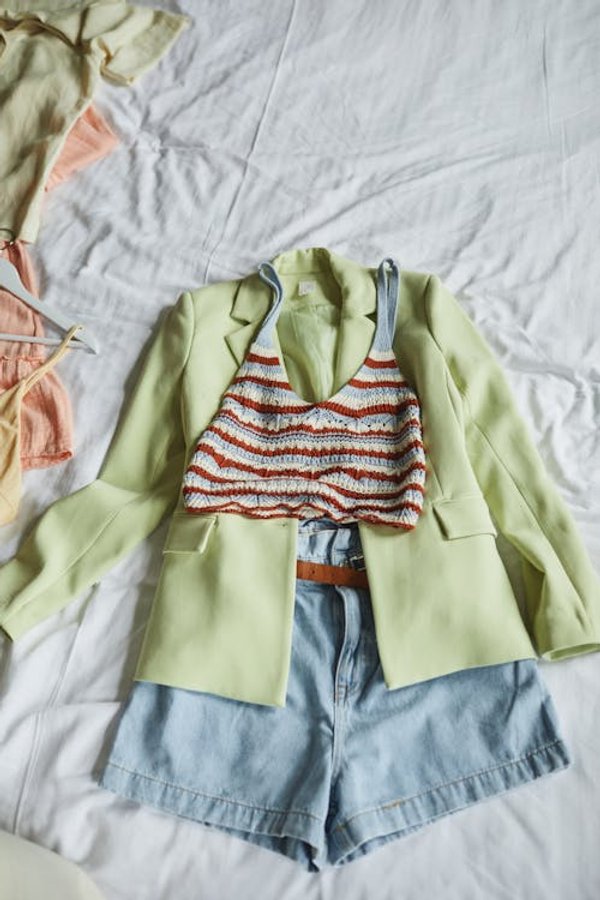 Original flatlay garment image - striped top arranged on white background