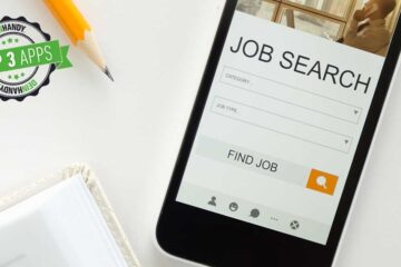 Job-App: Smartphone mit "Job Search" auf einem Tisch