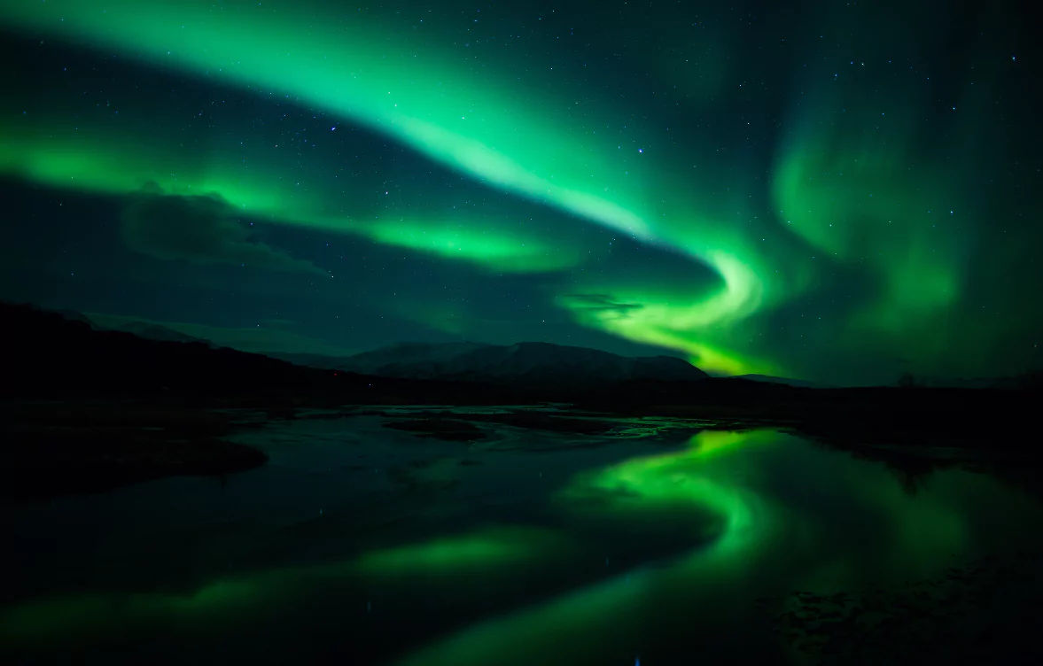 The Northern Lights Reflecting on a lake