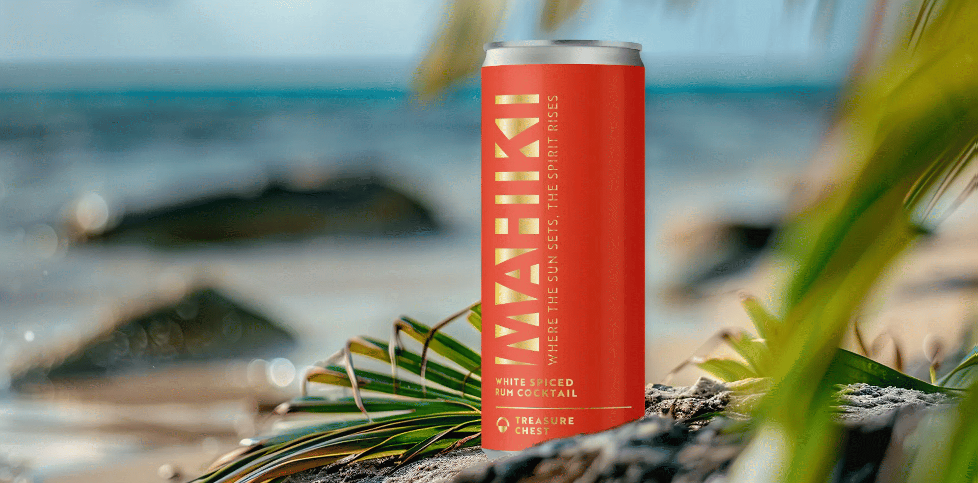 Mahiki Treasure Chest Ready-To-Drink can on a tropical beach