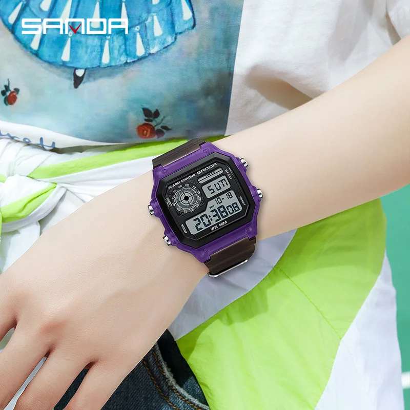 SANDA 6133 digital watch with purple transparent silicone strap showcasing time, date, and alarm features on a wrist