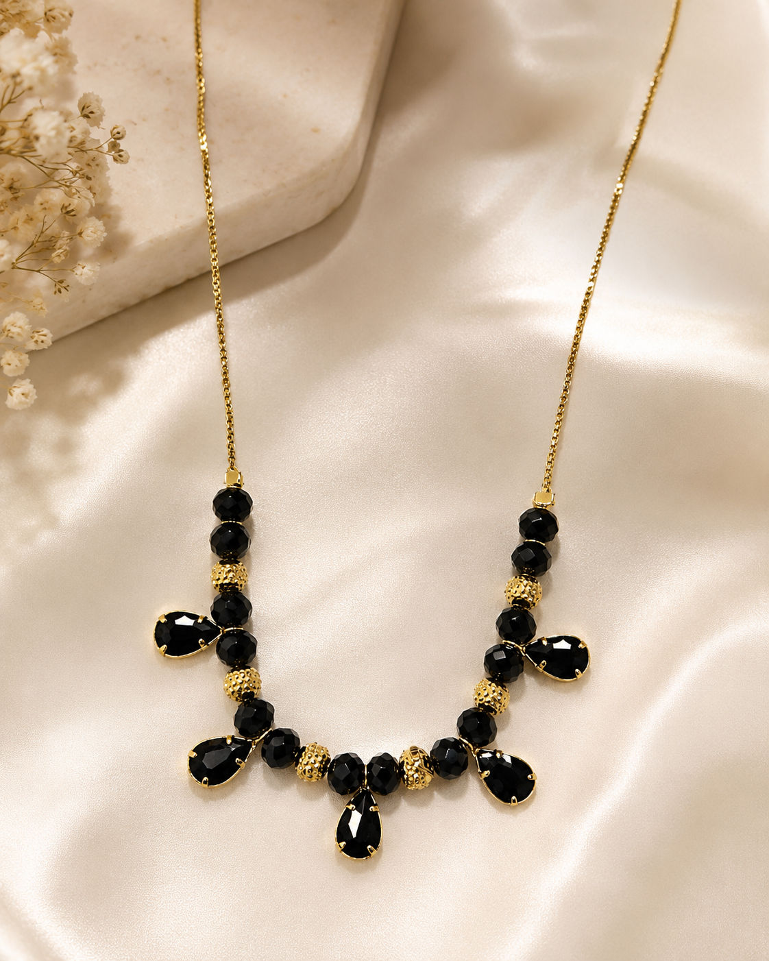 Noira Onyx Teardrop Necklace (Gold Covering)
