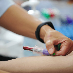 A blood sample is taken for anaemia test kits and diabetes tests.