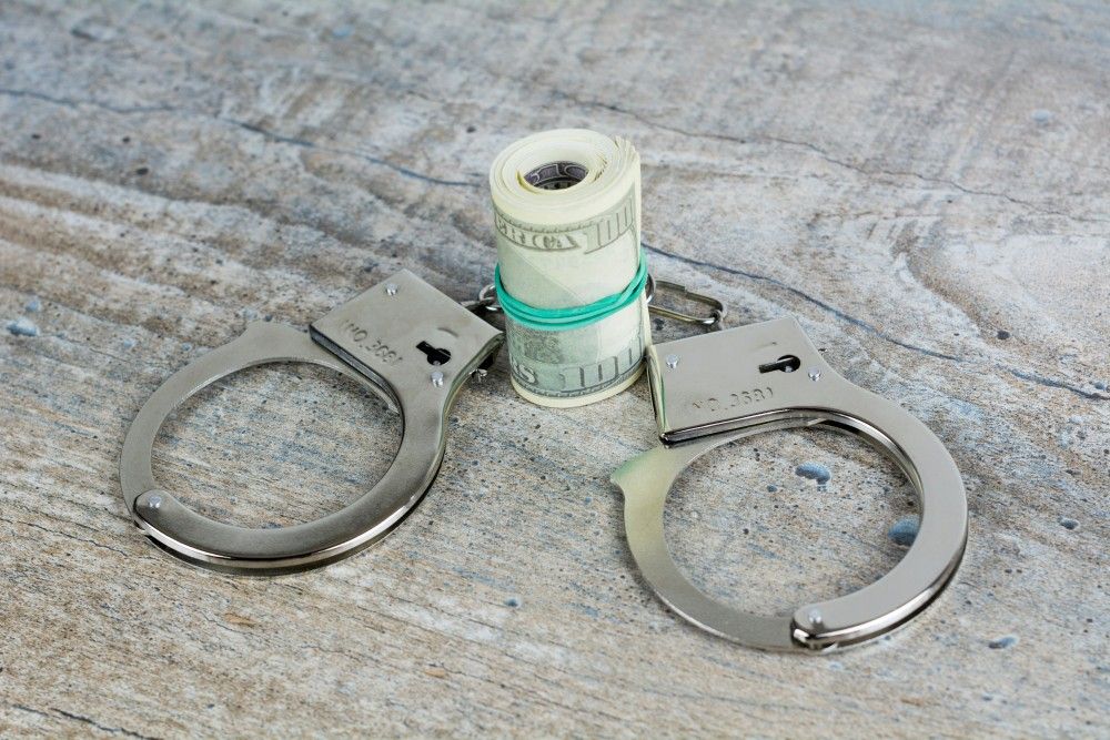 Dollars on handcuff