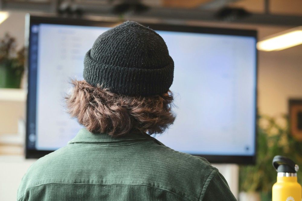 Man facing a computer screen