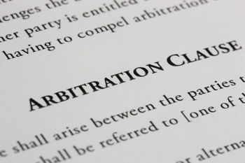 Pros and Cons of Arbitration Clauses in Business Contracts