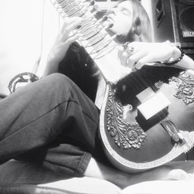 playing the Sitar which will feature more prominently on future releases