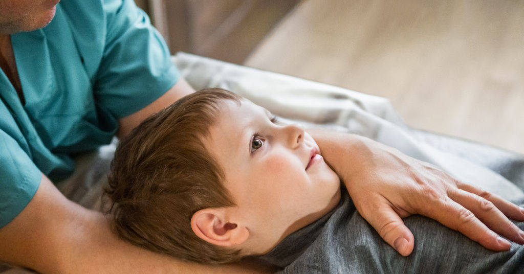 child gets chiropractic treatment