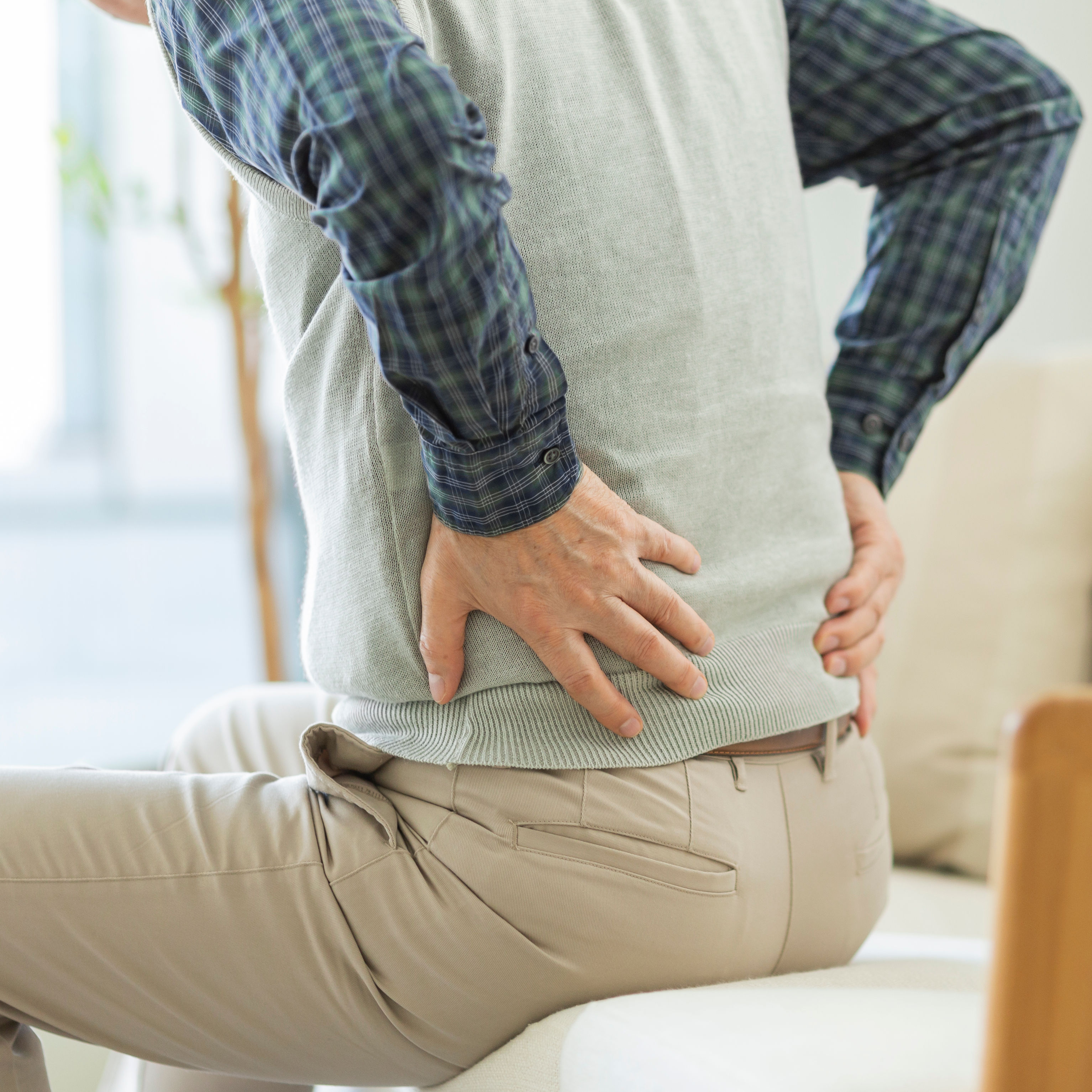Senior man hurting his back