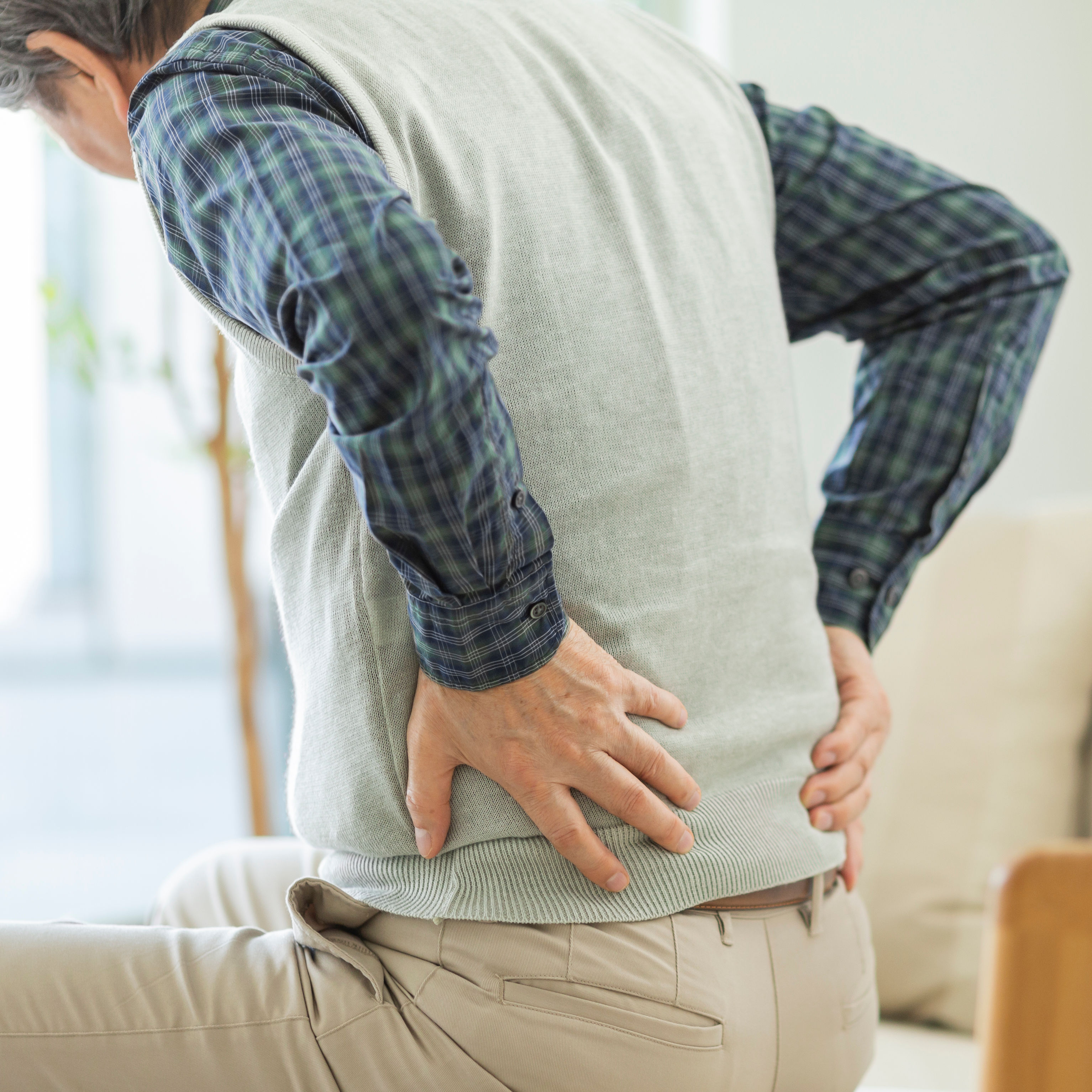 Senior man hurting his back