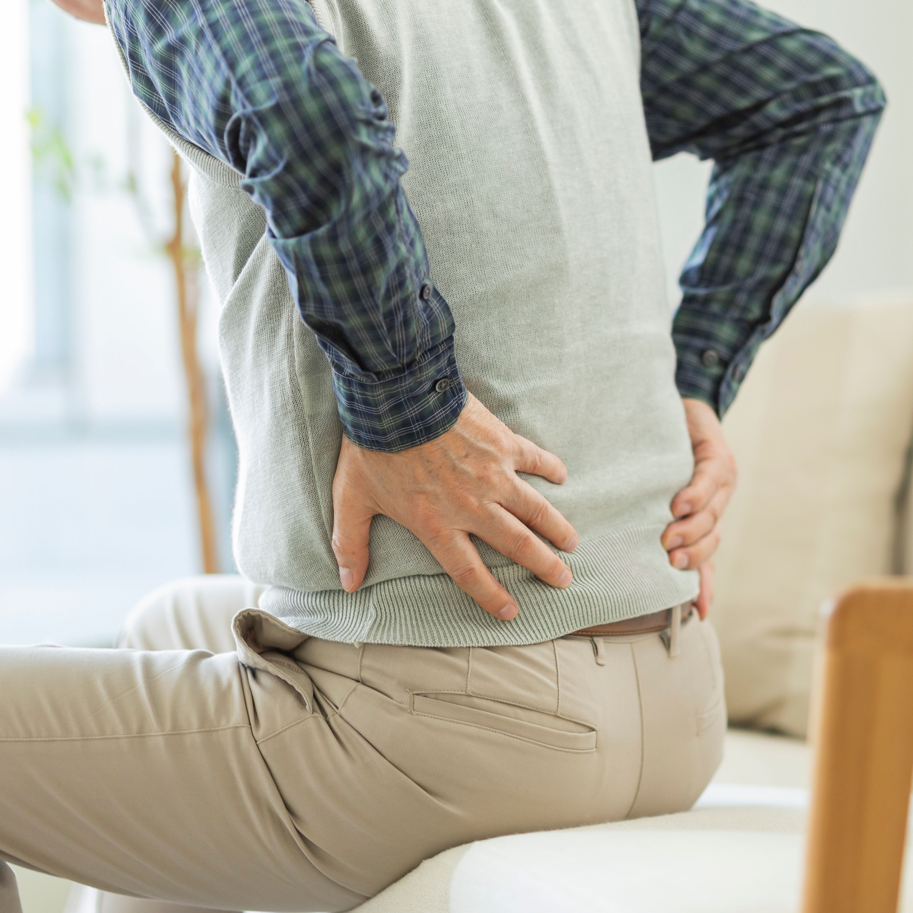 Senior man hurting his back