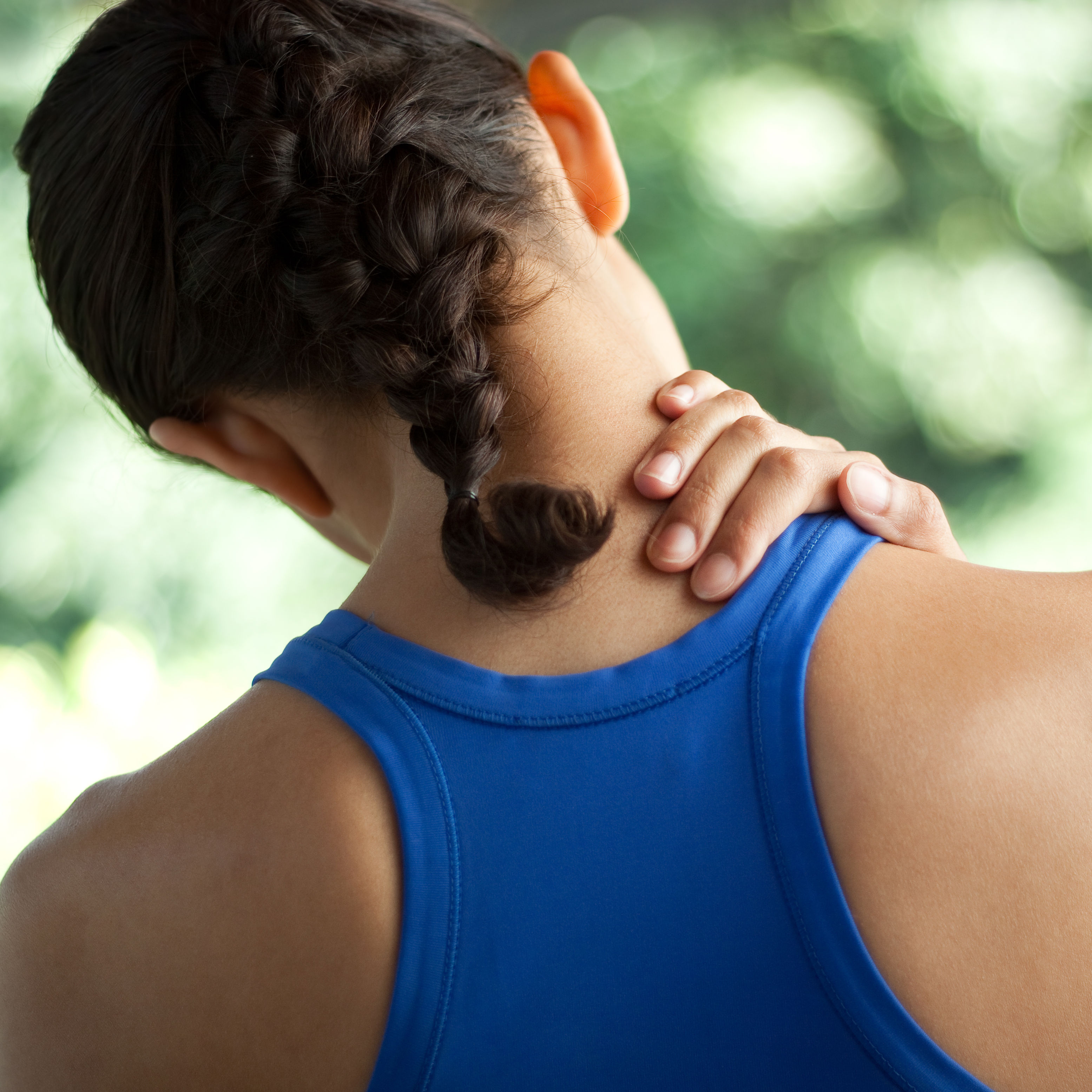 Young woman with neck pain
