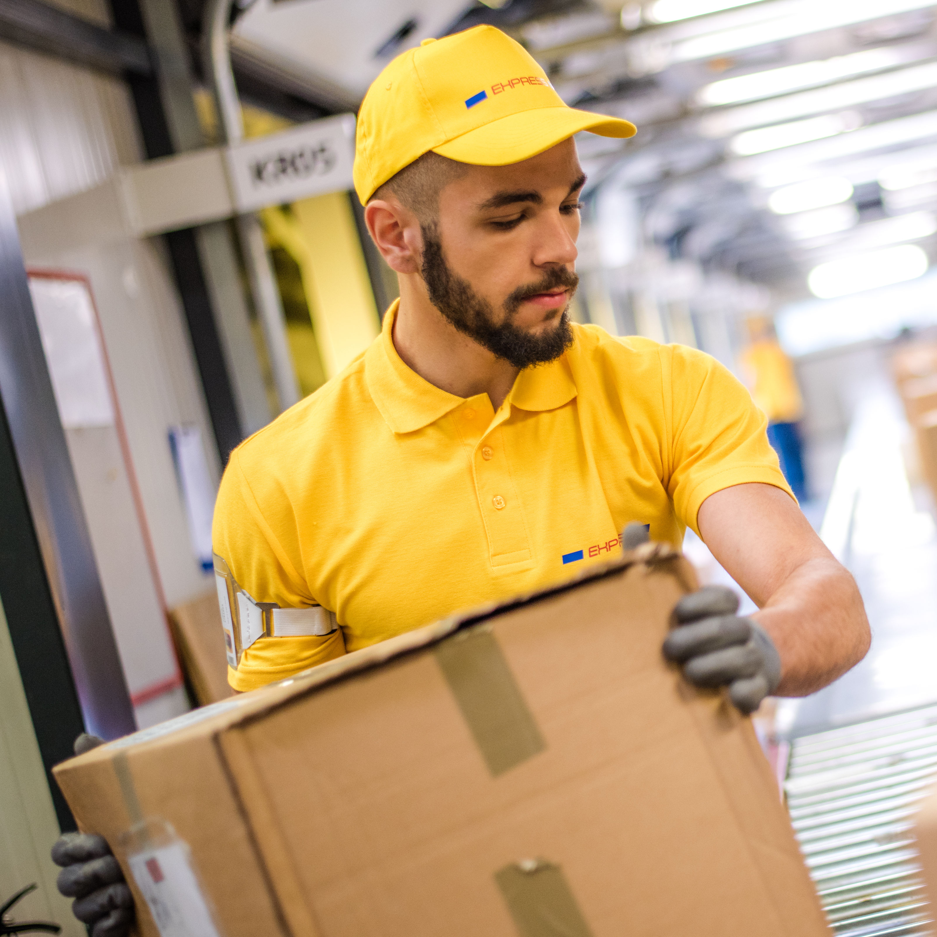 Man holding packed box