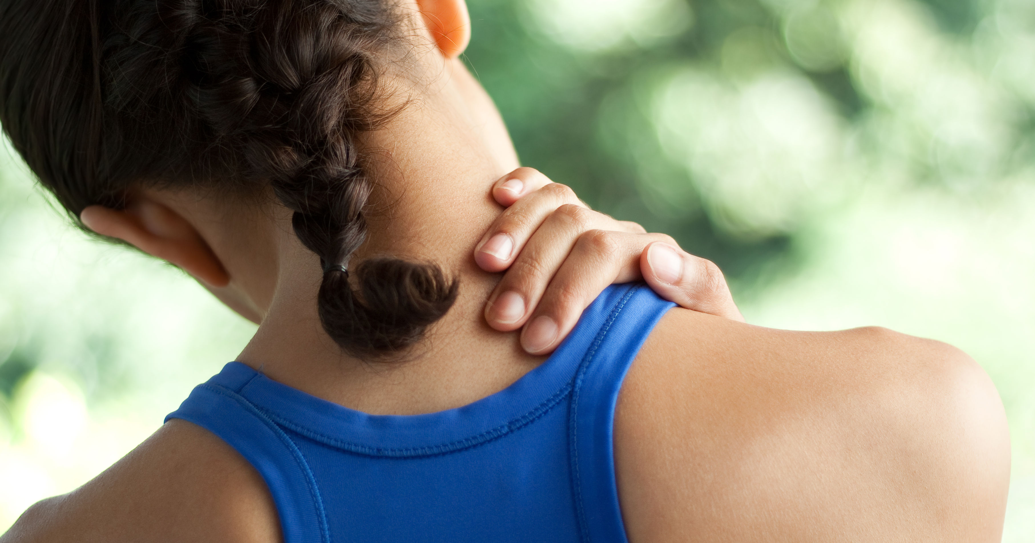 Young woman with neck pain