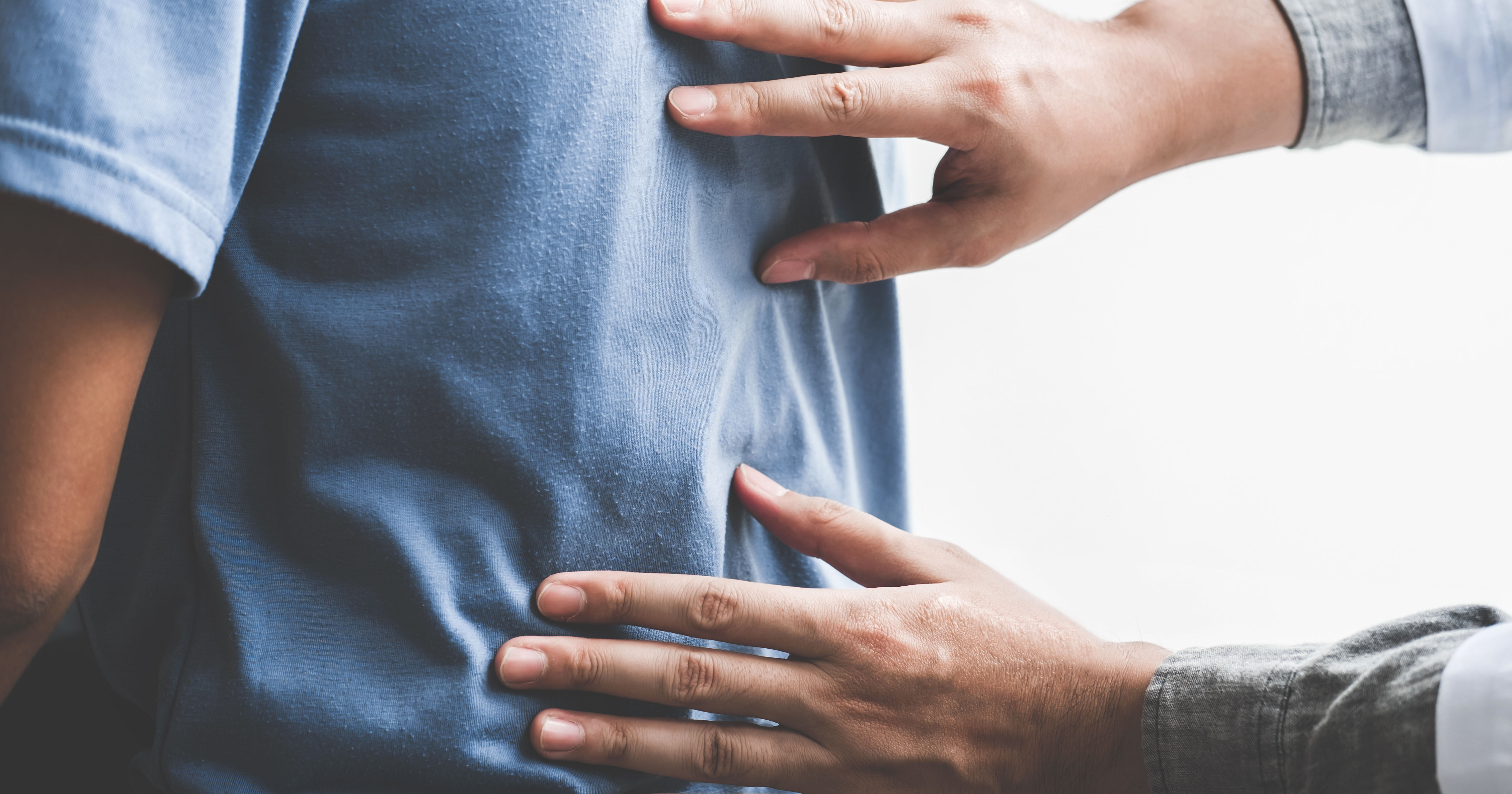 Doctor checking patient with spine to determine th