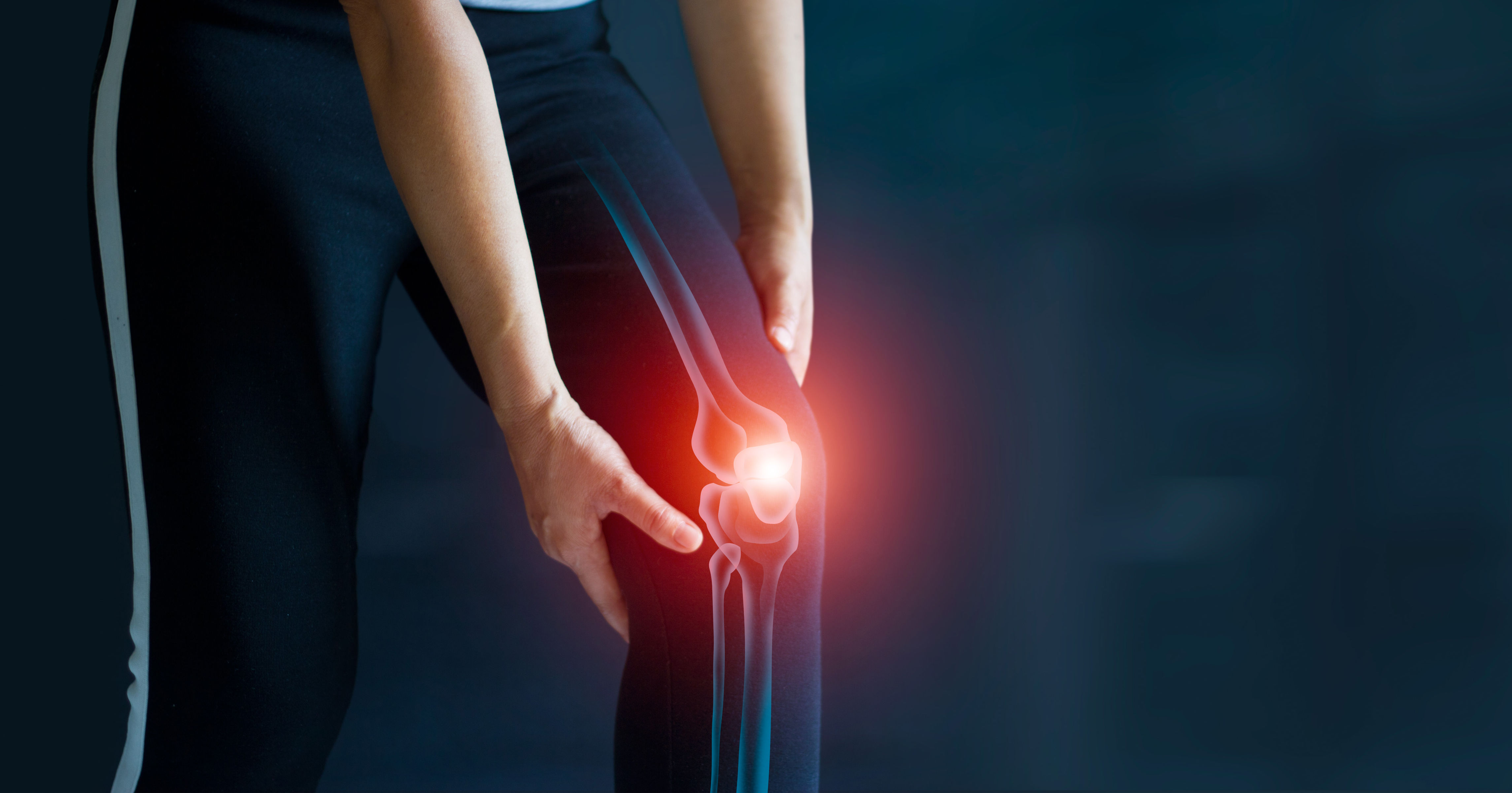 Sport woman suffering from pain in knee. Tendon pr