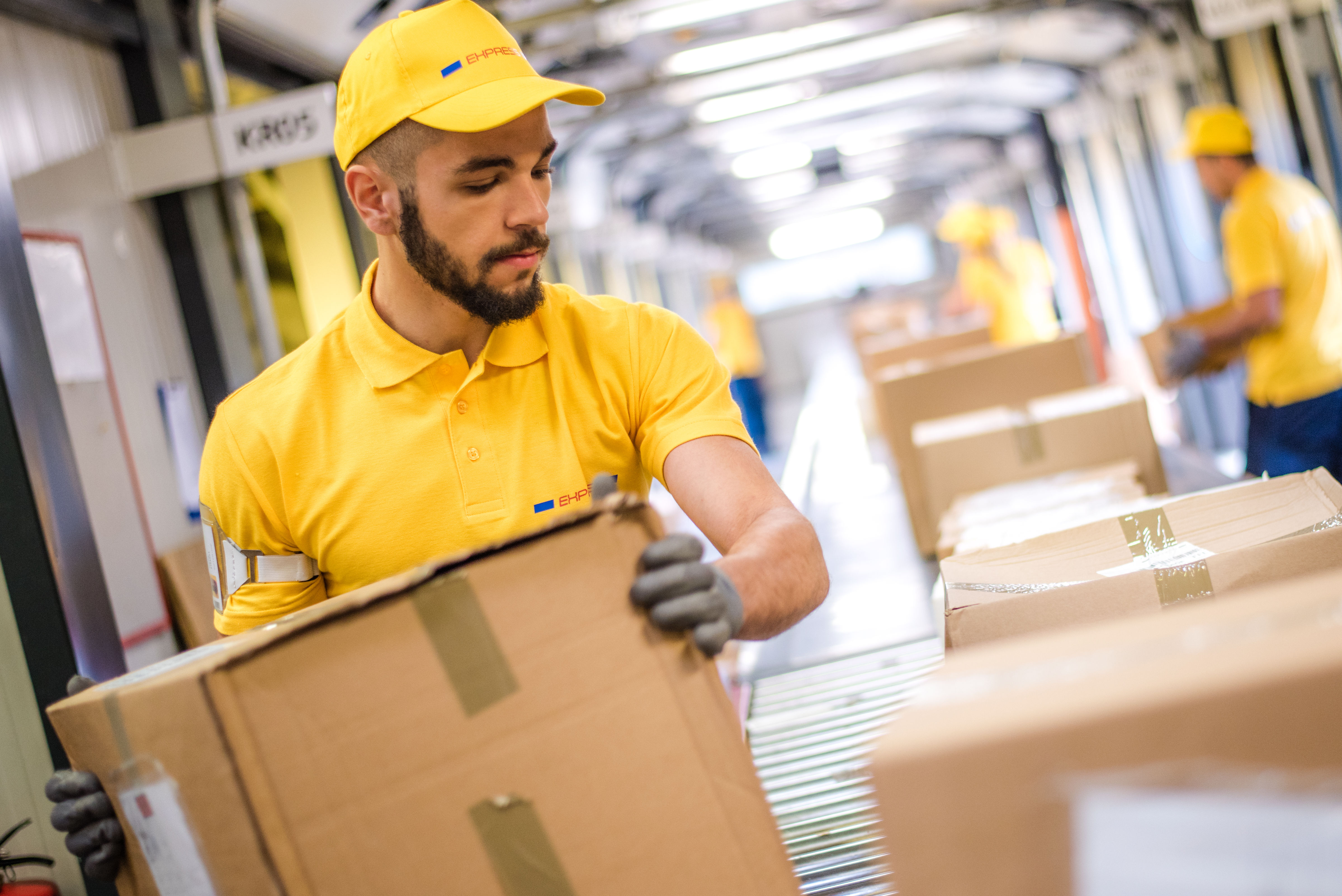 Man holding packed box