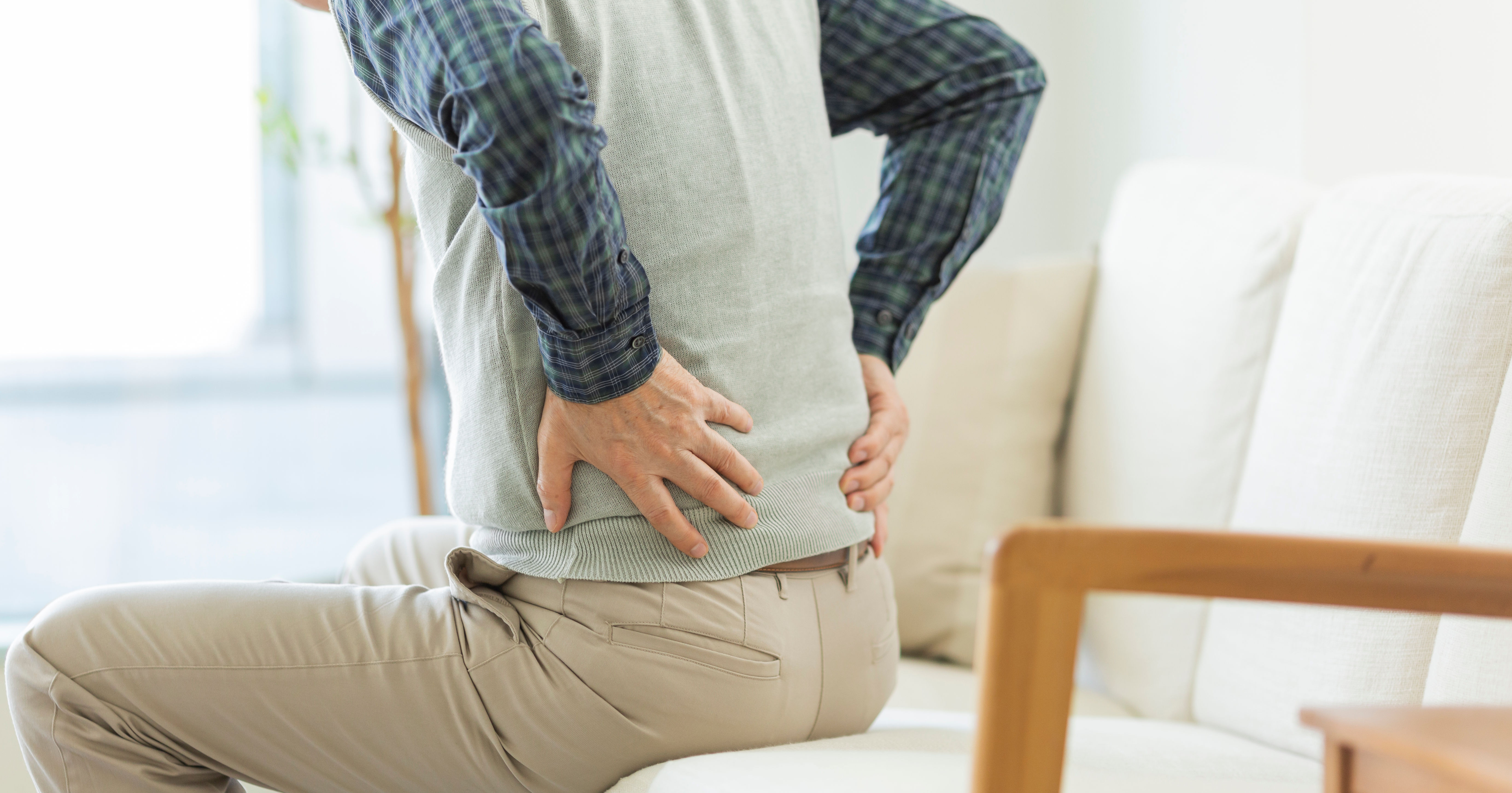 Senior man hurting his back