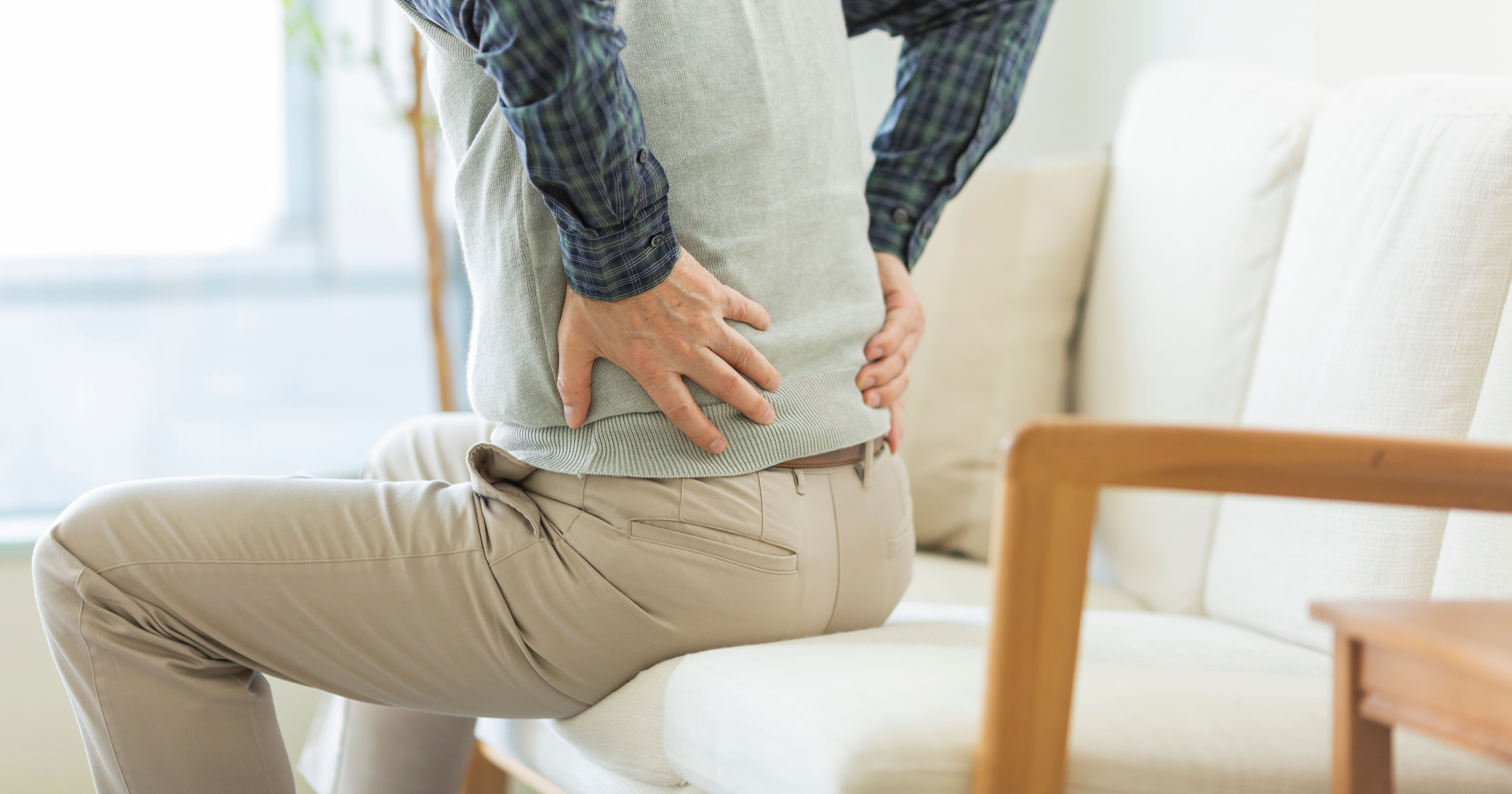 Senior man hurting his back