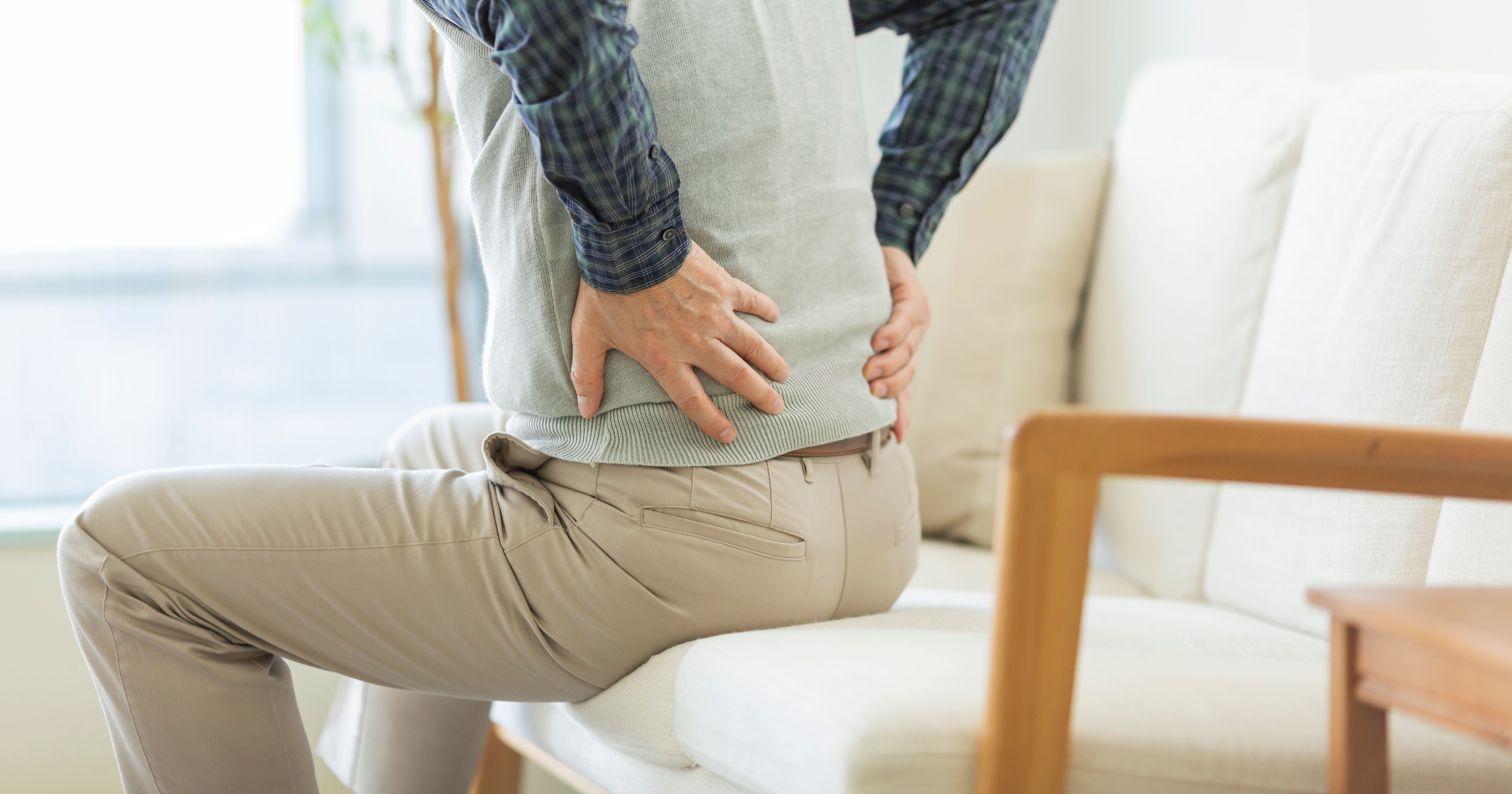 Senior man hurting his back