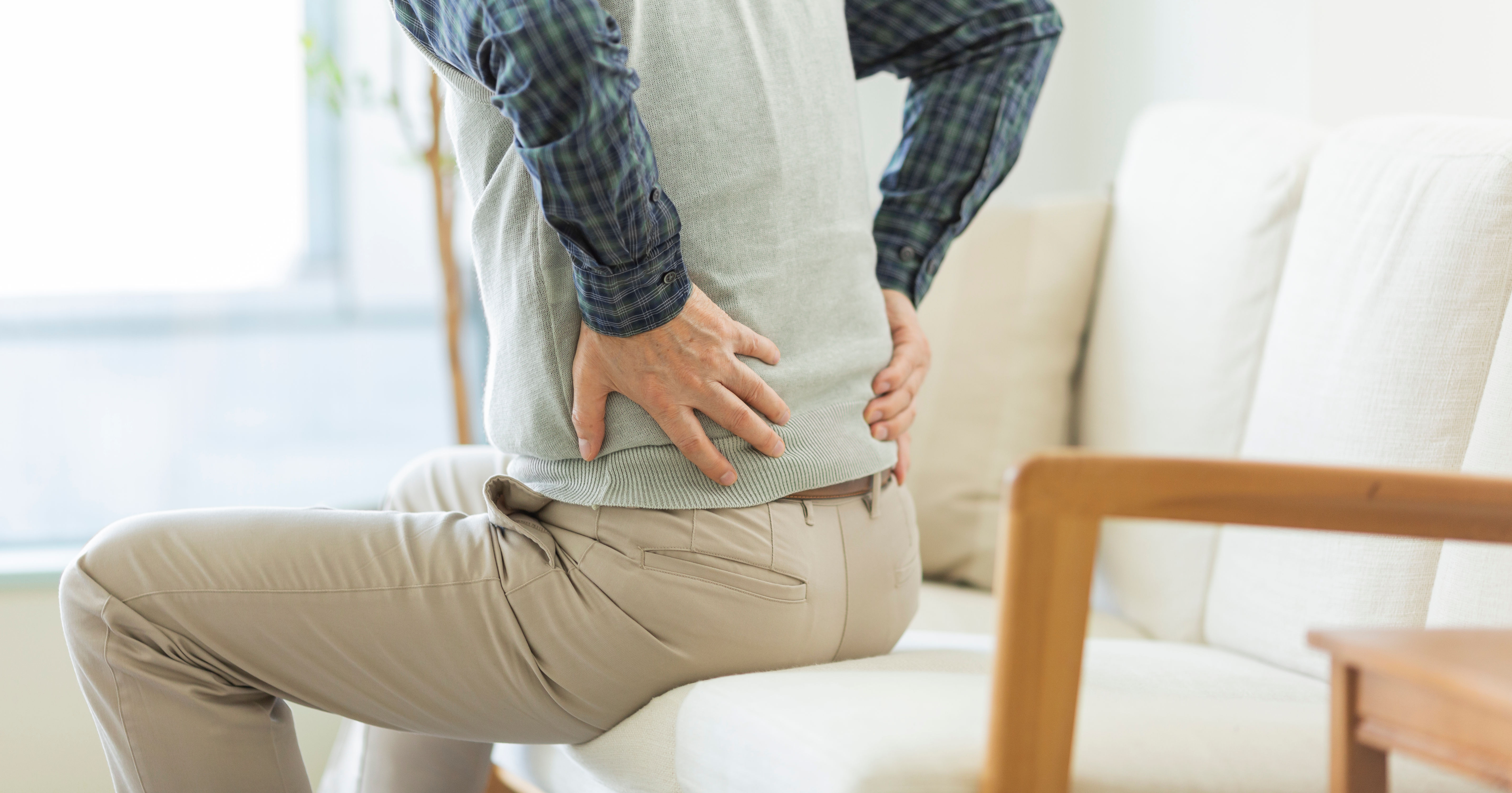 Senior man hurting his back