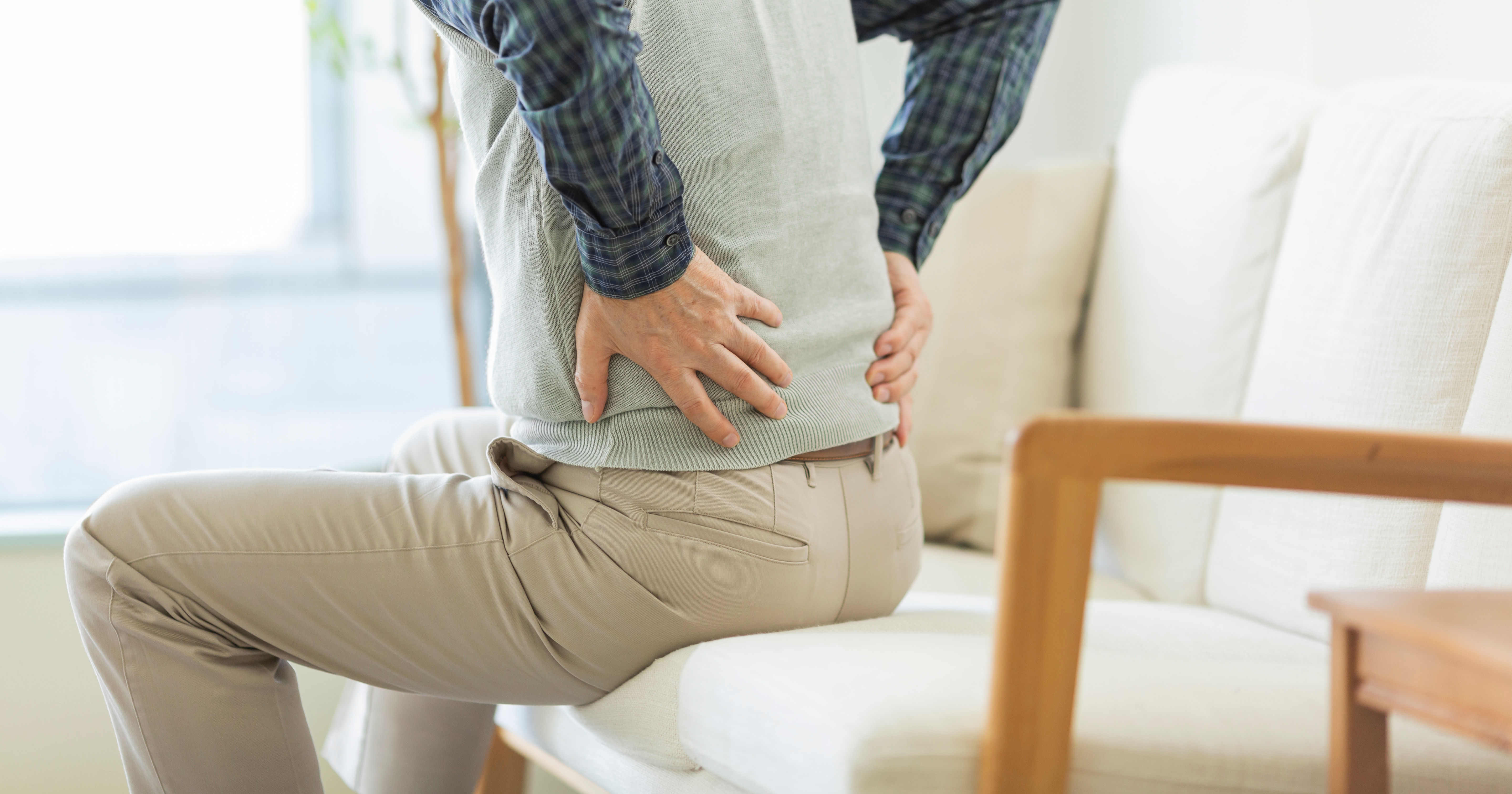 Senior man hurting his back