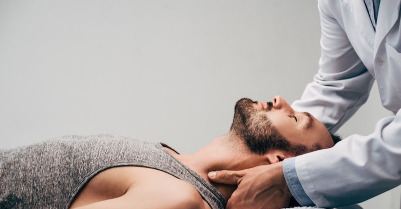 neck adjustment by chiropractor