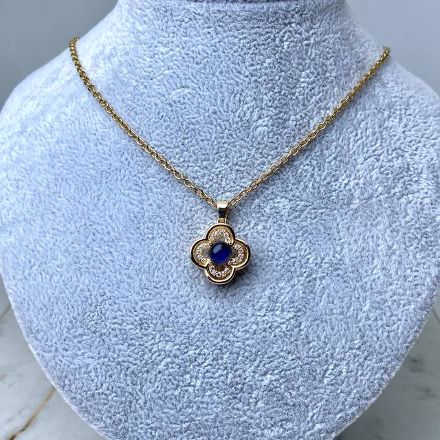 COLLAR ACERO DORADO DIJE GIRATORIO - FLOR CON MICROCRISTALES Y OPAL AZUL