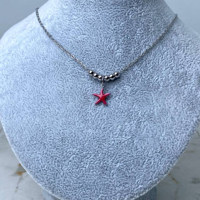 COLLAR CON BOLITAS - ESTRELLA DE MAR ROJA