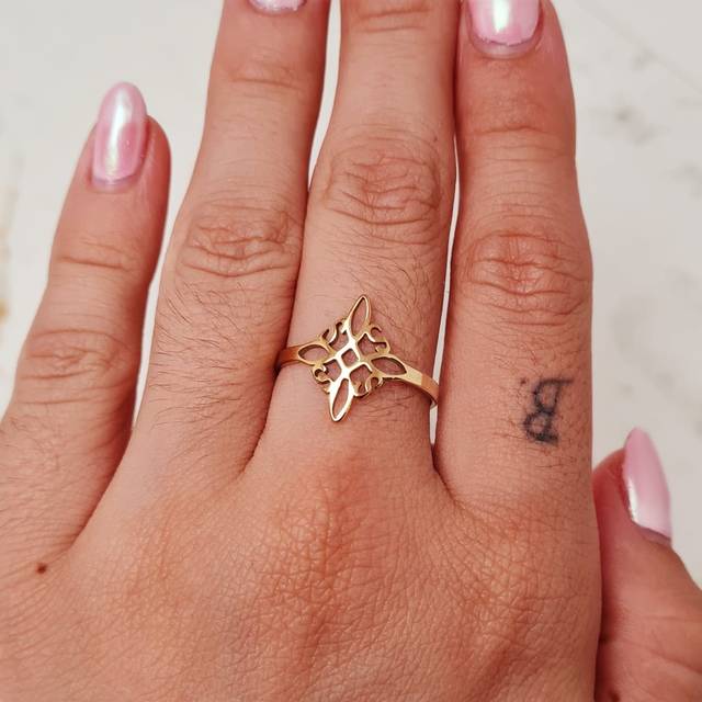 ANILLO ACERO DORADO - NUDO DE BRUJAS