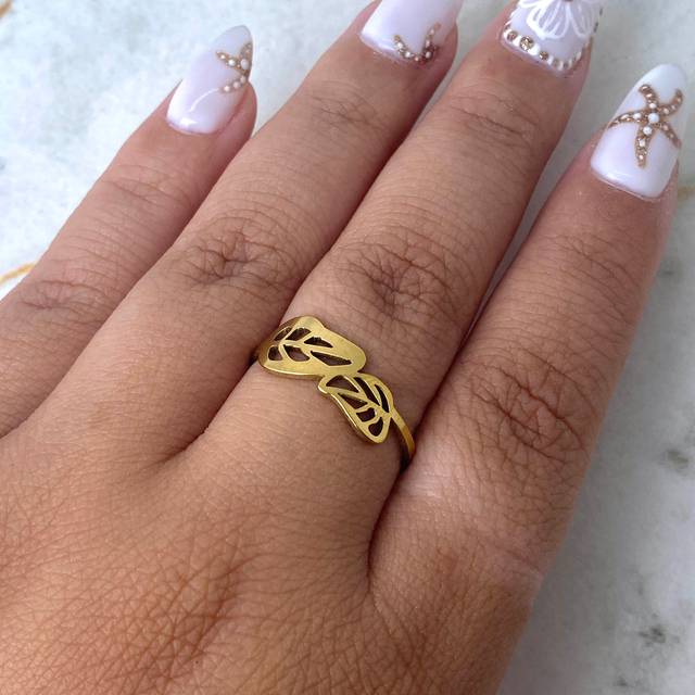 ANILLO ACERO DORADO DOBLE HOJA CALADA