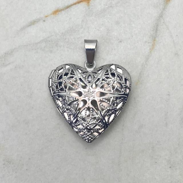 DIJE RELICARIO CORAZON CALADO