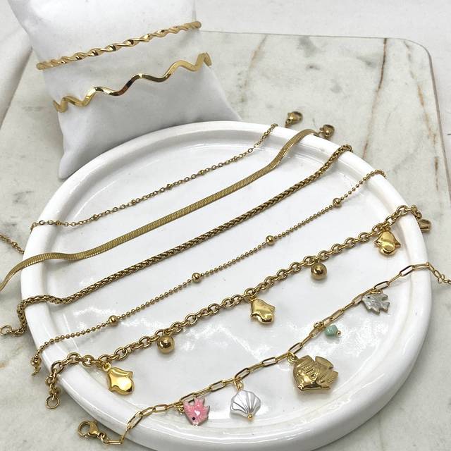 COMBO DE PULSERAS ACERO DORADO