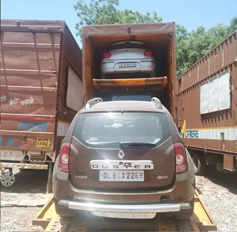 Multishift enclosed car carrier used for car and bike transport in Mumbai and Navi Mumbai