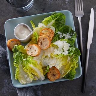 Little Gem Wedge Salad with Bacon, Blue Cheese, and Warm Garlic