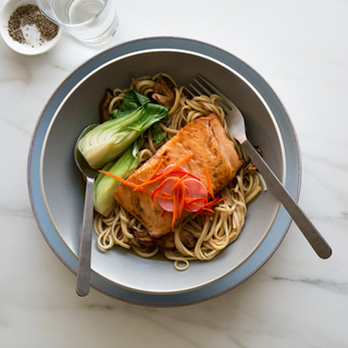 seared miso salmon fillet over udon noodles with baby bok choy