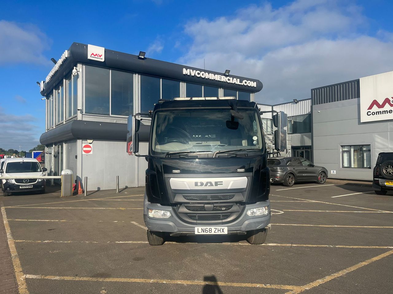 Ready to go DAF LF 260, Skip Loader, 260, 18 Tonne, Day Cab, 6-Speed Manual Gearbox, Rear Window in Cab, 2 Seats in Cab, Multi Function Steering Wheel, Radio, Hyva Autosheet, , -, - | for sale at MV Commercial, the UKs leading Truck, Trailers and Van supplier. (LN68ZHX 100115)