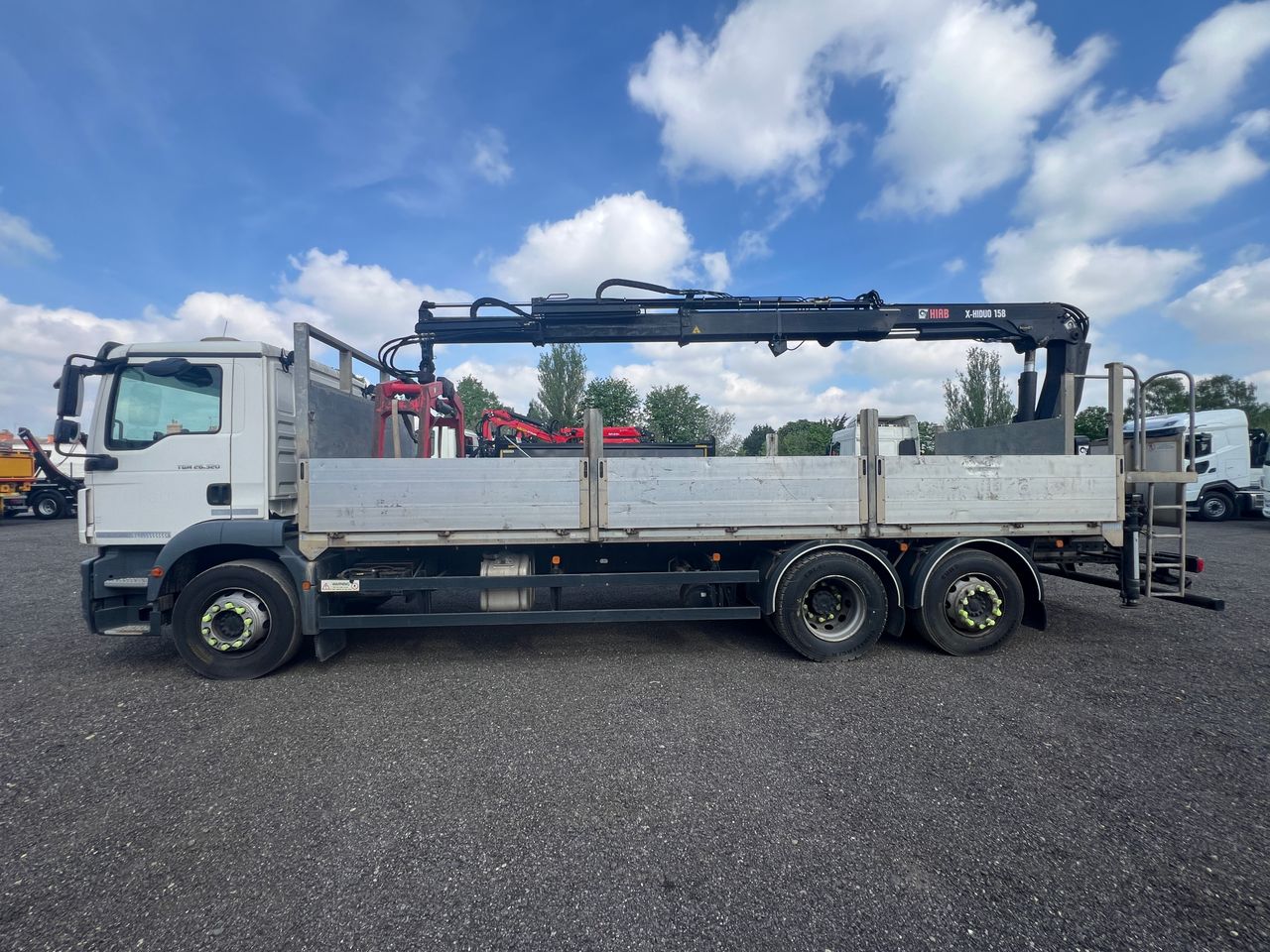 Ready to go MAN TGM 26.320, Brick Grabs, 320, 26 Tonne, Day Cab, Automatic, Cab Sunvisor With LED Lights, Full Aluminium Dropsides, Work Lights, Rear Advert Board Behind Crane in White GRP Finish., Beacon Bar, , HIAB, HIAB 158B-2 c/w Brick Grab | for sale at MV Commercial, the UKs leading Truck, Trailers and Van supplier. (SN68VZW 225983)