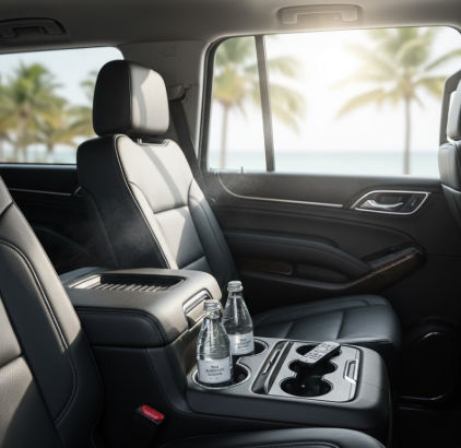 Transporte privado del aeropuerto de Cancún a Atelier en Suburban de lujo